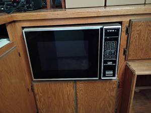 lot 3030 image: Retro Montgomery Wards Microwave Oven.  Very Clean on inside   15 x 25 x 18.   Located in basement