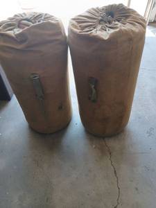 lot 4017 image: 2 Cylindrical Canvas Duffel Bags with Handles and  sleeping bags