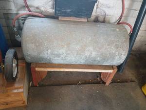 lot 4115 image: Portable Air Compressor Tank with Red Hose and Wheels buyer removes