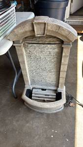 lot 4354 image: Outdoor Wall Fountain with Arched Stone-Look Surround and Pump Cord