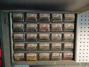 lot 4401 image: 25 Drawer Storage Bins with Contents, Mostly Electrical Items.  Will need to be removed from the wall