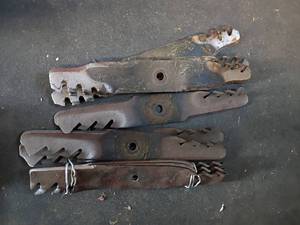 lot 4405 image: 15 pcs Various Metal Lawn Mower Blades with Mounting Holes.