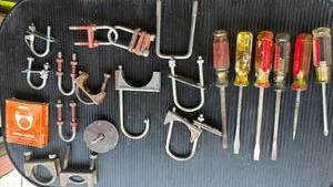 lot 4717 image: Muffler Clamps and Automotive Hardware Lot with Stanley Screwdrivers
