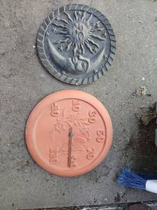 lot 5003 image: 2 Decorative Circular Wall Plaques Sun Moon Stars Flower Design