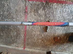lot 5049 image: Red String Trimmer with Curved Shaft and Attachment Head