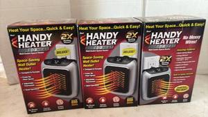 lot 4223 image: Handy Heater Turbo Heat Wall-Outlet Space Heater Lot of 3