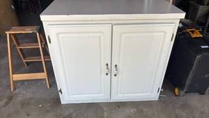 lot 4245 image: White 2-Door Cabinet with Shelving 35x39x29