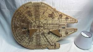 lot 80 image: Open Road Brands Millennium Falcon Wood Wall Art 9018197