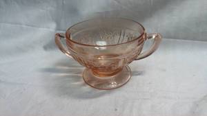 lot 116 image: Pink Depression Glass Footed Teacup with Floral Relief Pattern