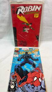 lot 176 image: DC Marvel Comic Book Lot Robin 80th Anniversary 100-Page & Web of Spider-Man #82