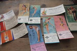 lot 1999 image: Antique 1940s Pin-Up Calendars & More
