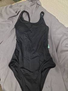 lot 851 image: XS Black Swimsuit  - Retail $0