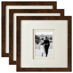 lot 96 image: Yaetm 12x12 Square Picture Frame Matted to 5x7, Double Floating Ivory Mat, Brown Wood Grain Photo Frame with Polished HD Tempered Glass for Wall Gallery, Home and Office, Wall Mounting, 3 Pack - Retail $537