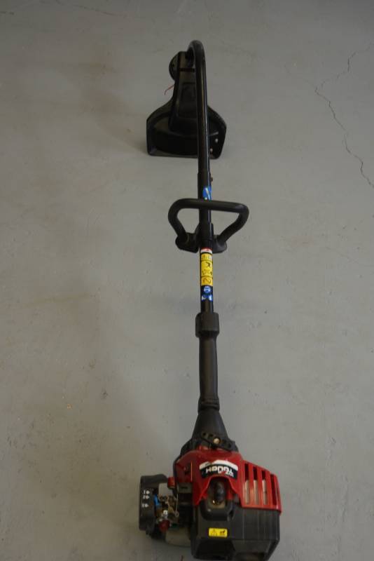 lot 31 image: Gas Powered Line Trimmer  Weed Eater  Pulls Free