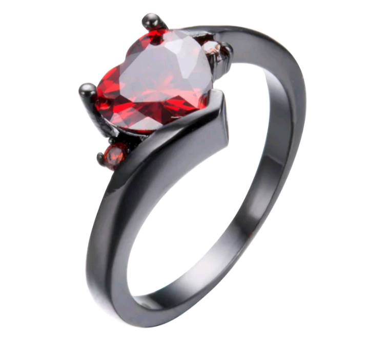 lot 269 image: Size 8  Heart Shaped Red Zircon Ring