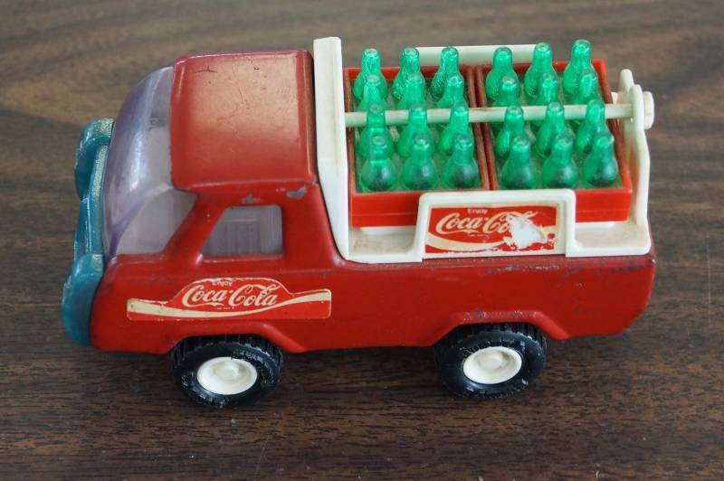 lot 228 image: Vintage Buddy L-  Coca-Cola  Truck With Cases of Coke Bottles