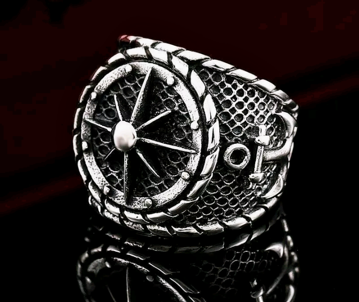 lot 287 image: Stainless Ships Wheel & Anchor Ring  Size 13