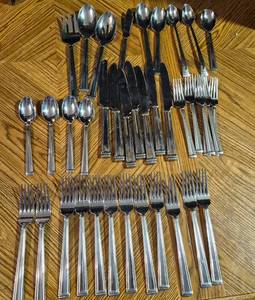 lot 101 image: Lenox Stainless Steel Flatware Set - Large Collection of Forks, Knives, and Spoons