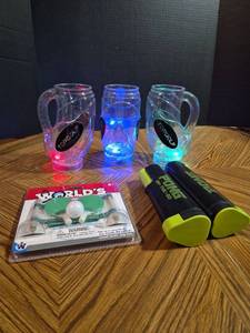 lot 121 image: TopGolf LED Light-Up Mugs, Pong On The Go Portable Net Set & Worlds Smallest Table Tennis Bundle