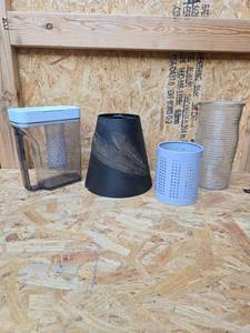 lot 315 image: Mixed Lot Pitcher with Filter Insert, Metal Lamp Shade, Perforated Metal Can, Glass Ribbed Vase 4 Items