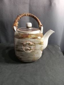 lot 60260 image: Ceramic Teapot with Woven Handle and Lid