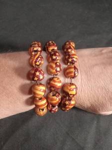 lot 60322 image: 3 Beaded Bracelets Red Gold Striped Star Pattern Elastic Stretch