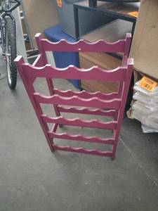 lot 63034 image: Purple free-standing wooden wine rack