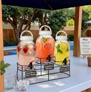 lot 6076 image: 3 Pcs Plastic Drink Dispenser with Spigot and Metal Stand 1.2 Gallon Beverage Dispenser for Parties Juice Dispensers Lemonade Jar with Lids for Cold Drink Tea Water Container