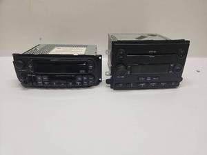 lot 10 image: Chrysler Car Audio Receivers CD MP3 Tape 2 Units P05091606AD