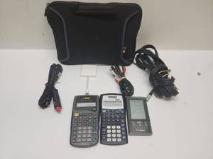 lot 16 image: Texas Instruments TI-30XA TI-30X IIS Calculators with L.L.Bean Device and Accessories