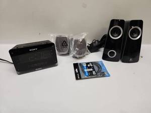 lot 34 image: Sony Dream Machine ICF-C1 AMFM Clock Radio with Logitech Speakers Bundle