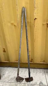lot 306 image: Pair of  garden hoes, sometimes called draw hoes or garden hoes, with wooden handles and forged steel heads.