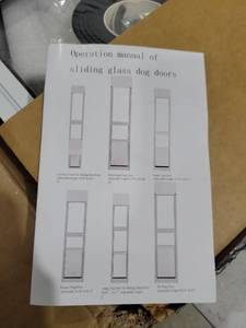 lot 7067 image: Sliding glass dog door