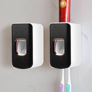 lot 7150 image: 2 Slot Toothbrush Holder and Toothpaste Dispenser Wall Mounted, Automatic Toothpaste Squeezer, 2 in 1 Tooth Brush Toothpaste Organizer for Shower (Black 2Pack)