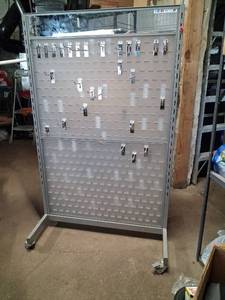 lot 2 image: Mobile Pegboard Display Stand with Hooks and Casters