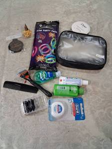 lot 52 image: Personal Care & Grooming Lot with Razors, Mouthwash, Shampoo, Glow Sticks, and Case