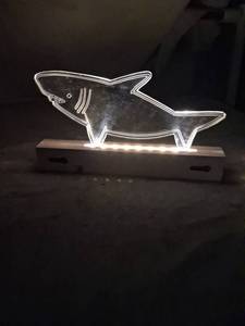 lot 82 image: Shark Neon Light Sign with Wood Base