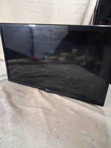 lot 99 image: LG Flat Panel Television with Wall Mount Bracket