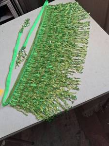 lot 105 image: Green Sequin Fringe Trim with Hanging Strands and Ribbon Ties