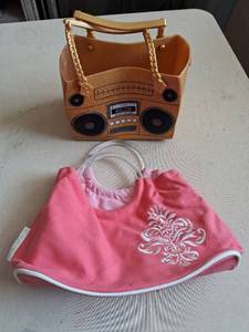 lot 109 image: Boombox-Shaped Handbag with Pink purse.