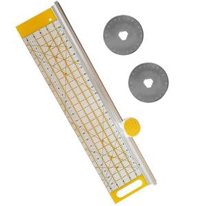 lot 8974 image: $56 45mm Rotary Cutter & 24x6 in Ruler with Gridlines, 2 Blades