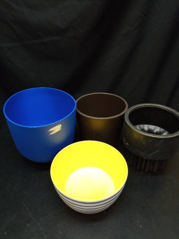 lot 2050 image: Set of Colorful Ceramic and Plastic Planters.   - Retail $22