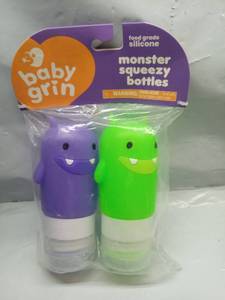 lot 2079 image: Baby Grin Monster Squeezy Bottles Food Grade Silicone 2-Pack Purple Green - Retail $8
