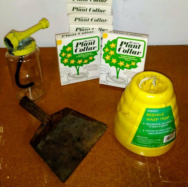 lot 129 image: Yard Lot  Plant Collars, Wasp Trap & More