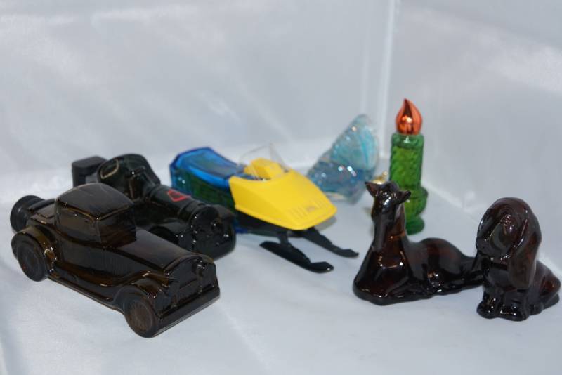 lot 212 image: Avon Decanter Lot- Some With Product
