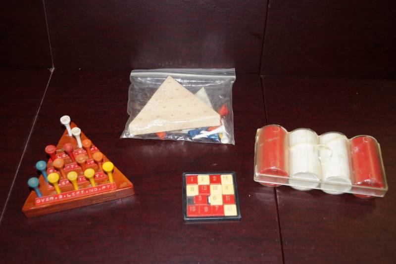 lot 279 image: 2 Triangle Peg Board Games, New Pkg of Poker Chips, & A Vintage 15 Number Slide Puzzle