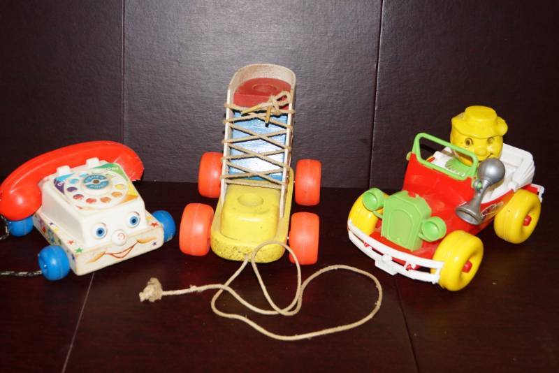 lot 286 image: CUTE  Vintage Rolling Toys  Learn to Tie