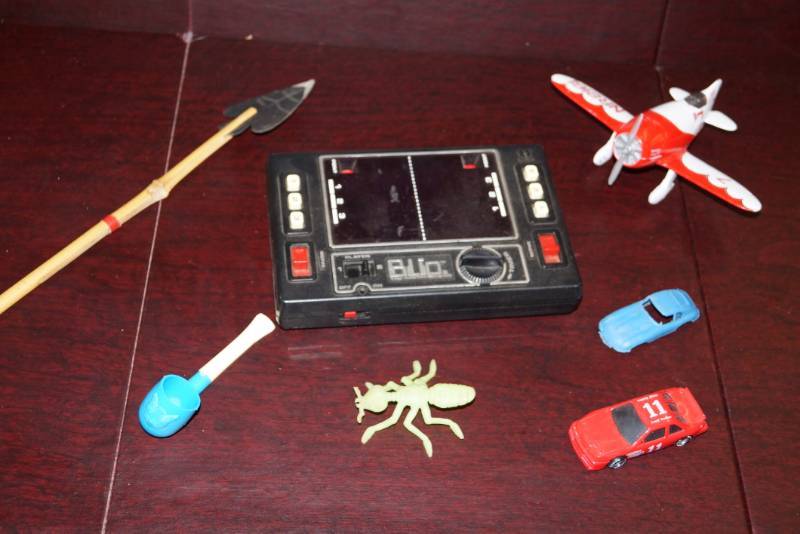 lot 289 image: Miscellaneous Lot of Vintage Toys Blip Electronic Game, Pipe Bubble Blower, Cars & More