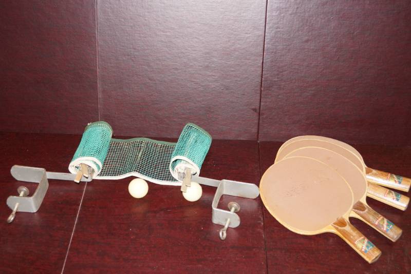 lot 300 image: Mid Century  Official Harvard Table Tennis, Four (3 Ply) Paddles & Net with Table Clamps