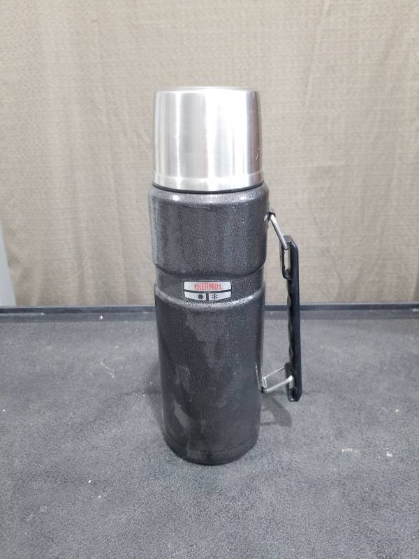 lot 1399 image: Thermos Brand Stainless Steel Insulated Vacuum Bottle with Handle